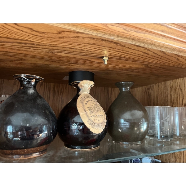 Collection of wing may lie Chinese distillery co vintage bottles and a variety of construction compa