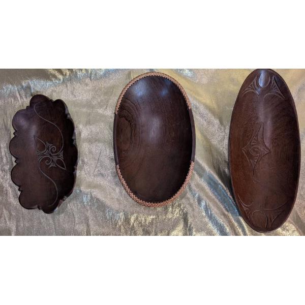 Three Hand-Carved Wooden Bowls with Unique Designs