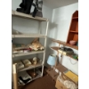 Image 4 :  four plastic shelves with all contents number of boxes of fabric blankets, leg boots, and a wooden 