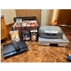 Image 1 : Sony PS3 with remote, Sony Radio/CD Player, Panasonic VHS/DVD player with an assortment of VHS