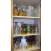 Image 1 : Contents of Multiple Cupboards: Glasses, Casseroles (No Lids), Salt and Pepper Shakers and More!