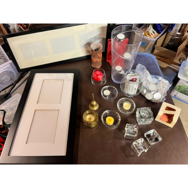 Assortment of candle holders with large bag of tea lights  little brass bell bookends picture Frames