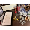 Image 1 : Assortment of candle holders with large bag of tea lights  little brass bell bookends picture Frames
