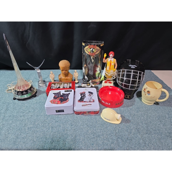 Collectables: Ronald McDonald Phone, Canadian Club Goalie Helmet, George Burns Figurine 