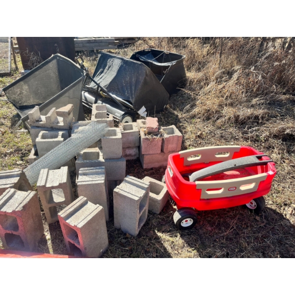 Bricks, 3 x grass catcher bags, Ingersoll Hi-Sweep 38 Lawn Sweeper and a little red tykes wagon. 