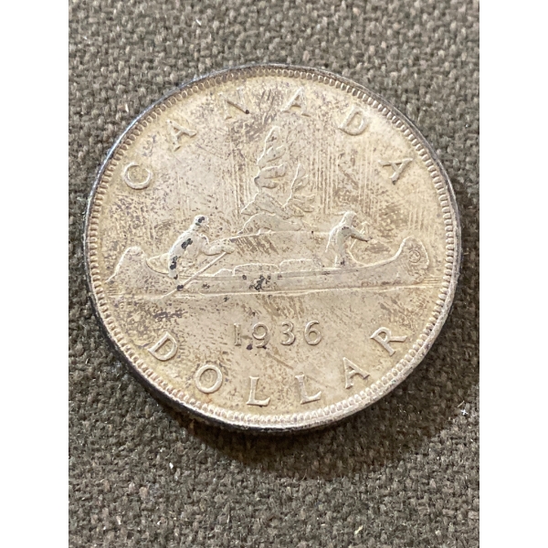 1936 Canada Silver Dollar Featuring King George V and Voyager Design