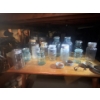 Image 1 :  13 assorted jars ranging from mason fruit jars, perfect seal, Kerr company, nabob, and jewel jar. A