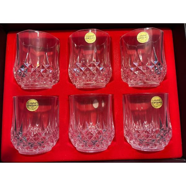  six Longchamp crystal glasses you never used