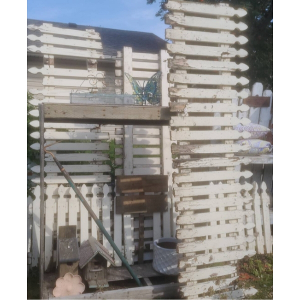 Rustic Garden Decor With Fencing, Birdhouses, Planters and Accents