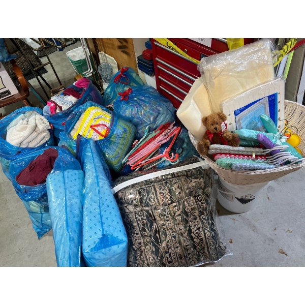 large collection of pillows, wedges, blankets, towels, hangers, and bathroom miscellaneous 