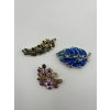 Image 1 : 3 Beautifully Elegant Brooches With Their Own Colourful Crystals To Enhance The Vibrant Sparkle.  
