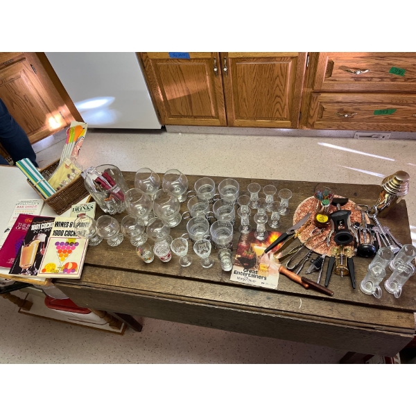large collection of barware, including small shot glasses brand new glasses and number of them from 