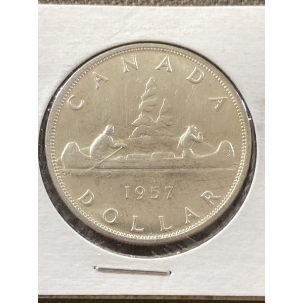 1957 Canada Silver Dollar with Canoe Design