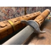 Image 5 :  traditional Southeast Asian short sword, likely a Dha (also spelled Dah or Darb) hand carved wooden