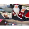 Image 4 : Santa statue 28” and Christmas express train Christmas globe and a small statue set Mrs. Claus and M