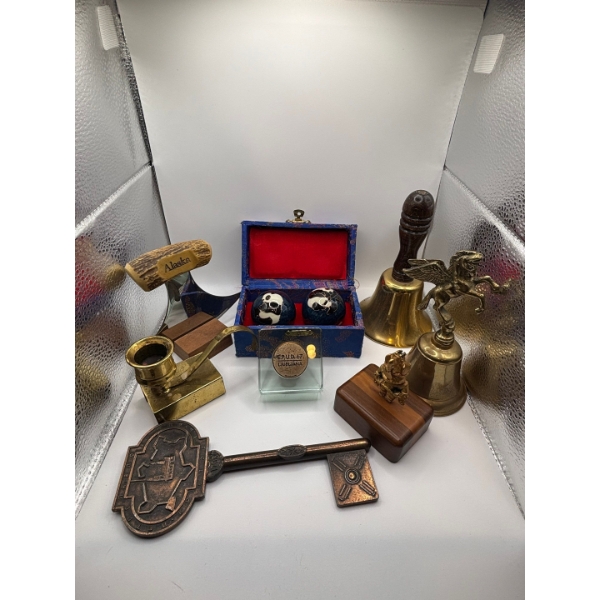llection of brass bells, and other collectables along with set of medicine balls