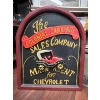 Image 1 : This is a hand-painted wooden sign advertising "The Colonial Carriage Sales Company" 