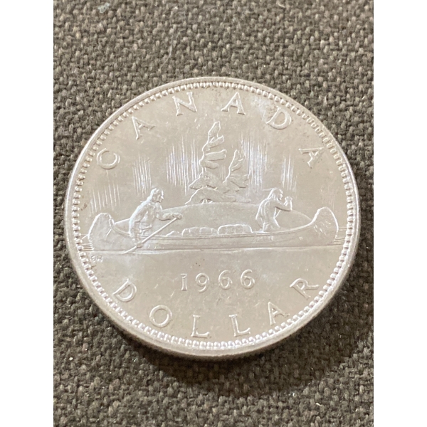 1966 Canadian One Dollar Coin in Silver with Canoe Design