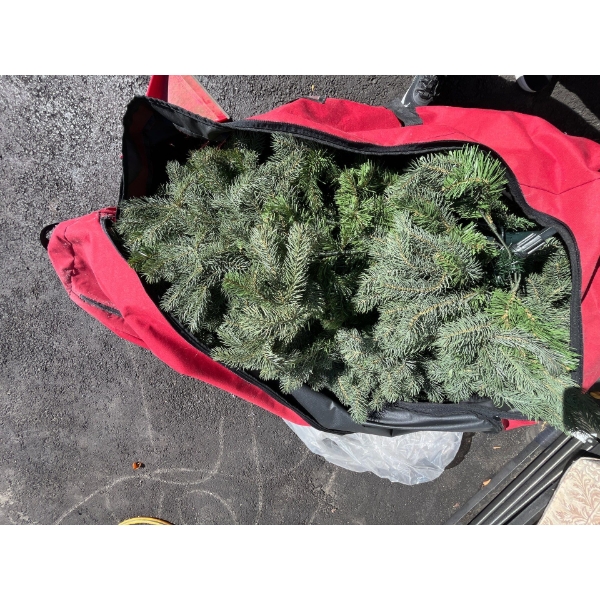 7 foot pre-lit Christmas tree with large red, caring bag and all decorations snowman themed .
