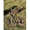 Image 1 : hand crafted love and joy signs  made from railway pins and crafted in Alberta