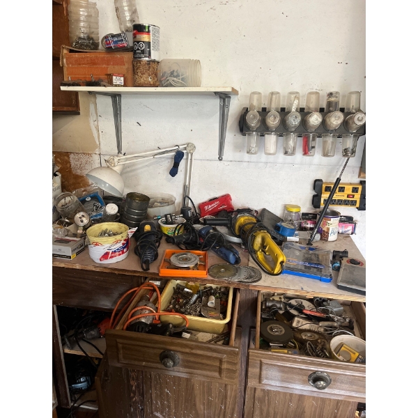  large selection of power tools, including grinders drills, a number of bolt bins, and other miscell