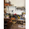 Image 1 :  large selection of power tools, including grinders drills, a number of bolt bins, and other miscell