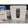 Image 5 : Three Electronic Items: Portable Radio, Fitness Tracker, and Keychain Echo Device