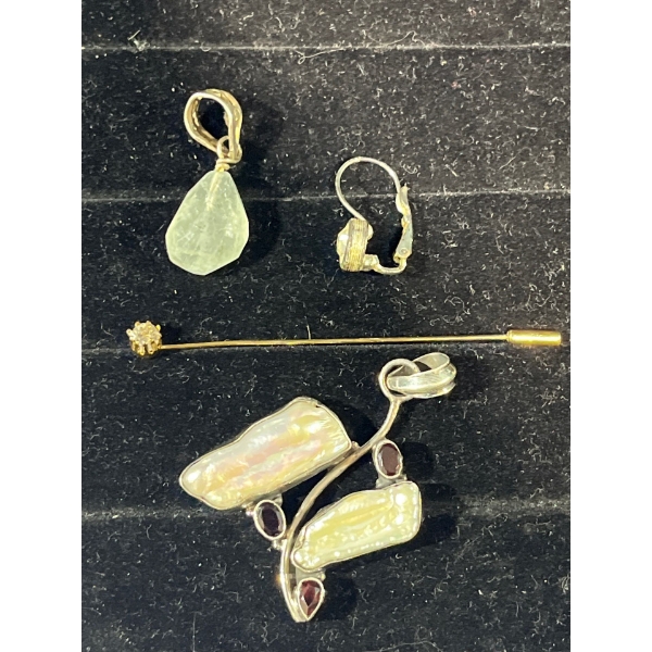 Collection of White Stone Pendants and Pins