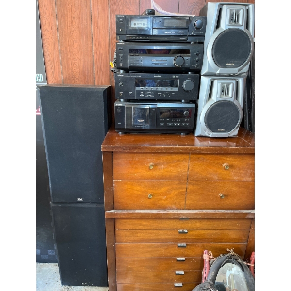 collection of Sony and Yamaha stereo equipment with remote controls, cassette player two receivers a