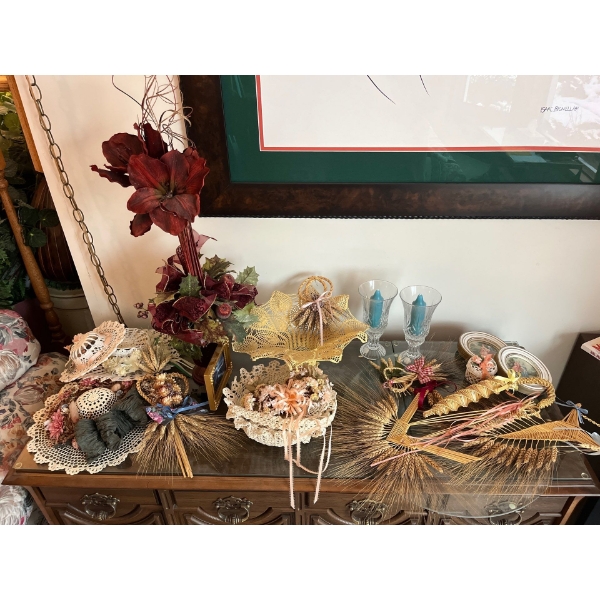 collection of weave baskets, wheat, art, candleholders, and two small framed picture