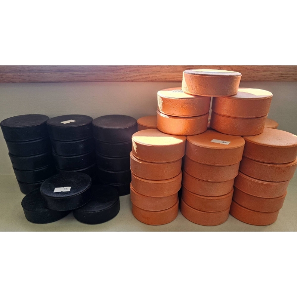 Black and Orange Foam Hockey Pucks