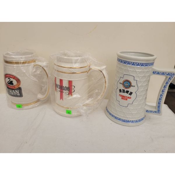 Three Ceramic Beer Steins Featuring Swan Premium, Michelob, and Tsingtao Branding