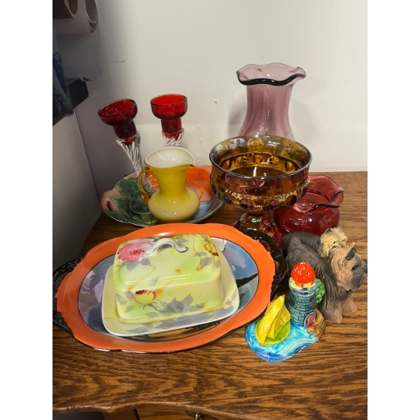 Glassware, butterdish, two candle holders, lighthouse salt and pepper shakers, and yorkie figurines.