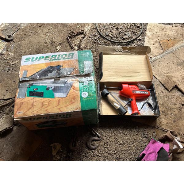Superior power tools 7 inch tile cutting saw and Black & Decker battery operator, caulking gun