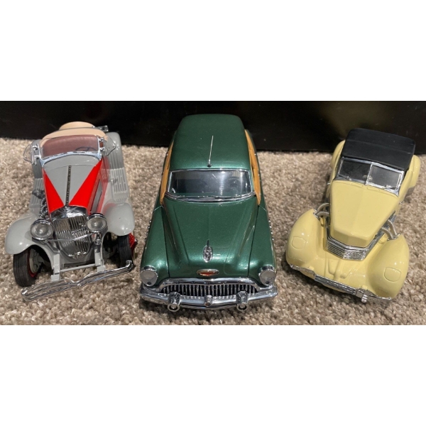 1953 Buick Estate Wagan/ 1937 Cord 812 Pheaton Coupe/ 1935 Duesenberg SSJ
