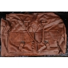 Image 4 : Three Bags: Red Suitcase, Brown Duffel Bag, and Green/Gray Hiking Backpack