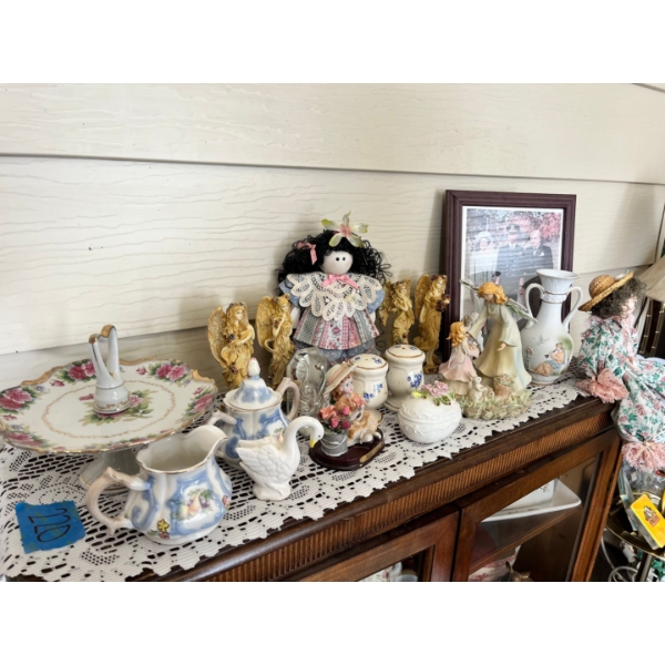 Collection of vintage-style decorative items. Figurines, salt and pepper shakers, porcelain angel 