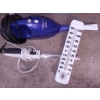 Image 3 : Utility Items Including Handheld Vacuum, Thermometer, Electric Knife, and Box of Casters