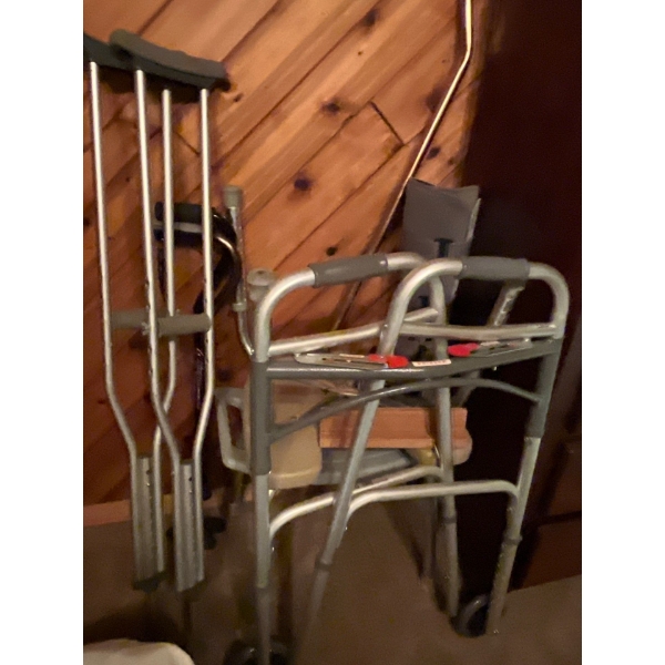 Selection of Medical Assistance Equipment. Canes, Crutches, Shower Chair, Walker, Peddler, And Air B