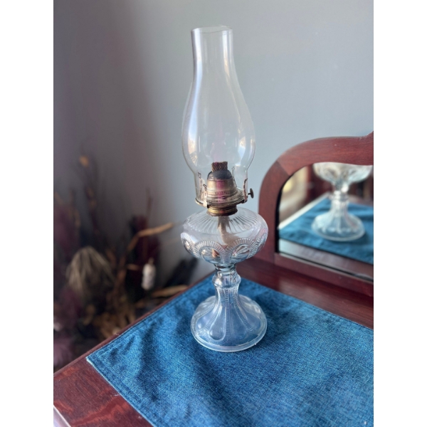 Antique Glass Oil Lamp with Ribbed Base &amp; Brass Burner
17.75 in high
 Oil well diameter 5 in