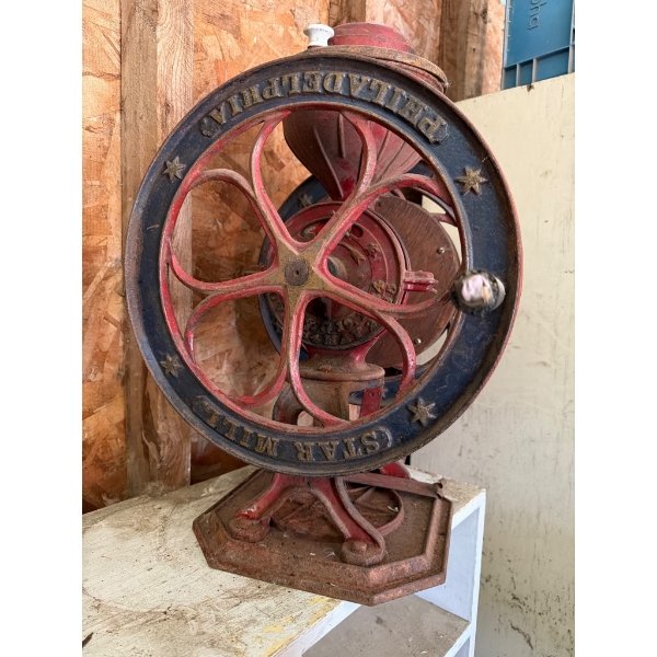 Antique 1884 Star Mill coffee grinder, manufactured in Philadelphia. The grinder features cast iron 