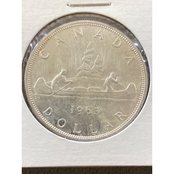 1963 Canadian Silver Dollar Coin Featuring Canoe Design