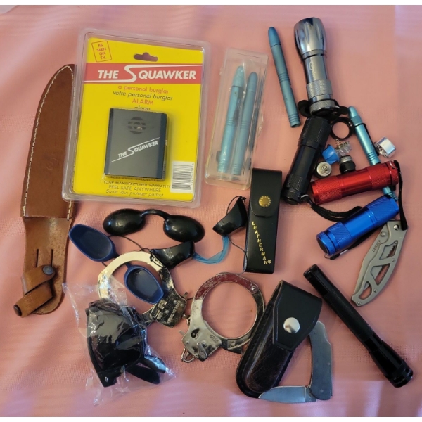 Assorted Pocket Jam - Knives Handcuffs Flashlights Key Tags Multi Tool & More