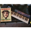 Image 1 : Keyboard and Fleetwood Mac World Tour Book
