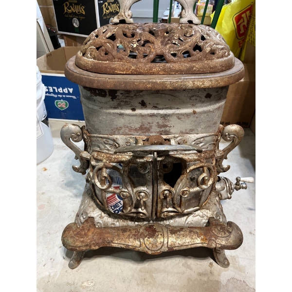  cast-iron woodstove from Burrow Stuart at Melanie COLTD Hamilton Ontario Garnet number 134