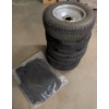 Image 1 : 4 Lightly Used Tires w/ NEW Car Matts 