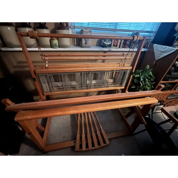 4-shaft, 22” Nilus Leclerc Medico table loom, that was “converted” to a floor loom. It is in amazing
