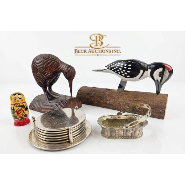 Decorative Items Including Wooden Figurines and Silver Pieces