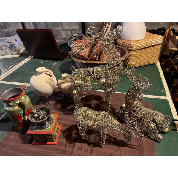 a number of small kitchen ornaments with three reindeer statues