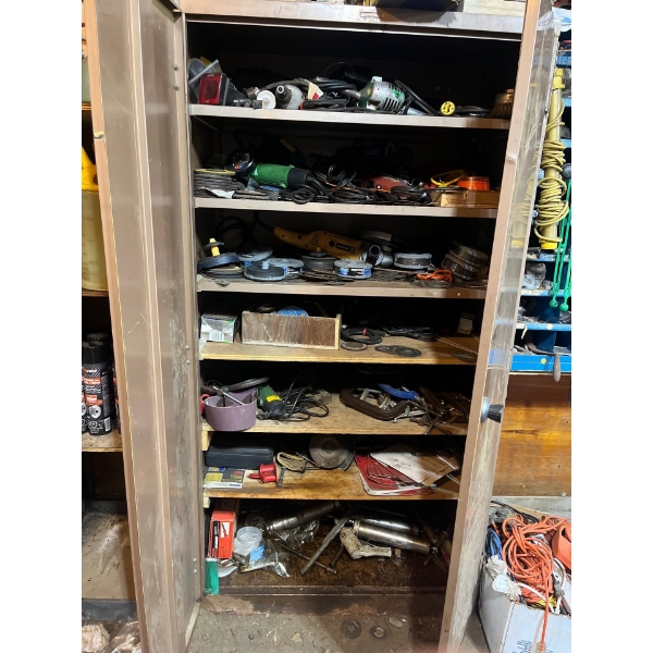  Large cabinet full of grinders grinding wheels several packs of new grinding wheels drills several 
